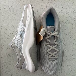 Nike Women's Light Gray and White Athletic Shoes
